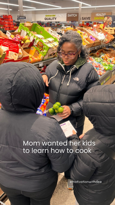 Photo of me teaching a cooking class as part of taking intentional actions during my faith journey